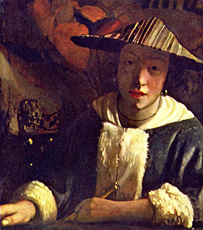 Small close-up painting of a young woman holding a flute and wearing a tall hat, presented by the National Gallery of Art as Studio of Johannes Vermeer.